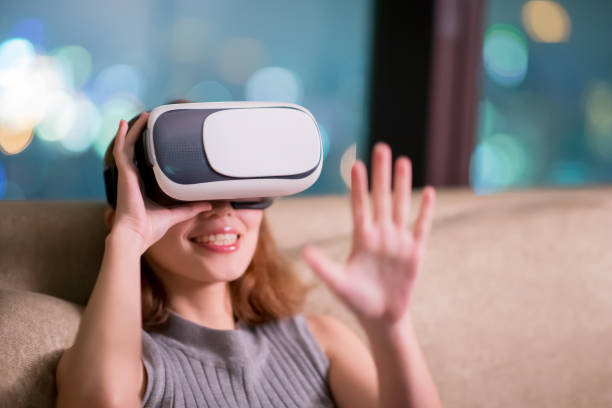 istock woman wear virtual reality headset 1059254786