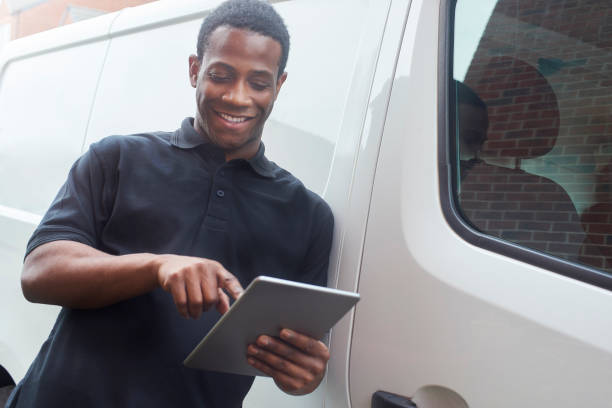 istock Tradesman sorting out job list on digital tablet 1059261798