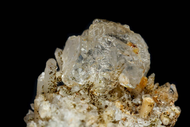 istock Macro mineral stone fluorite with quartz against black background 1059262656
