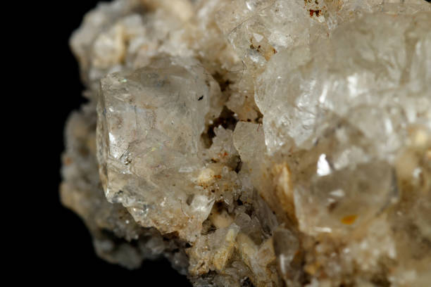 istock Macro mineral stone fluorite with quartz against black background 1059262848