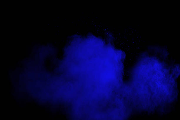 istock abstract blue dust explosion on  black background ,abstract blue powder splattered on black background , Freeze motion of blue powder exploding. 1059263434