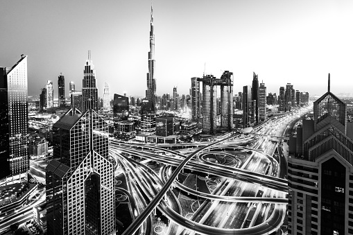 Dubai skyline with traffic junction and Burj Khalifa 
bw