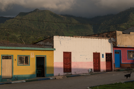 Facade of countryside village with sunset light on the facade. Colombia.