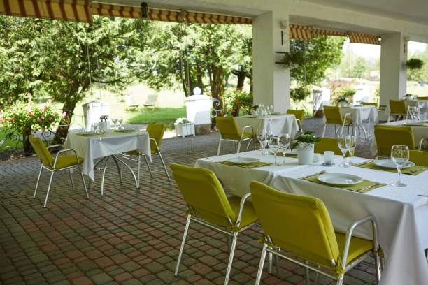 istock terrace summer cafe with tables and chairs for people, an empty institution for recreation, nobody 1059269846