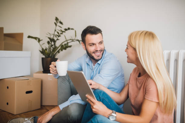 istock Happy couple with digital tablet 1059270660