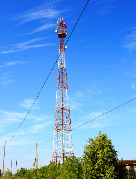 istock Red and white communication tower with beautiful clear sky 1059277696