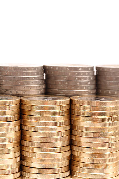 istock Coins organized in columns and rows isolated on white background 105928111