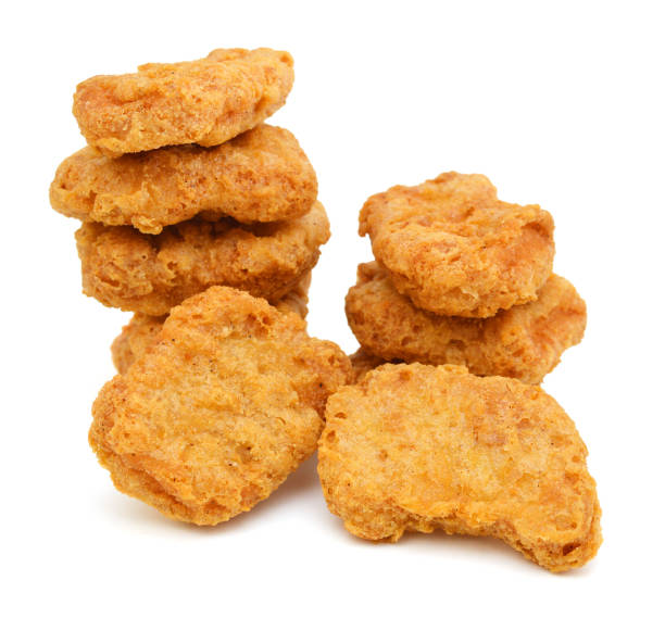 istock Macro of fried chicken nuggets high resolution 1059283086
