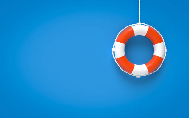 青の背景に生命ブイ - 救命浮輪 ストックフォトと画像