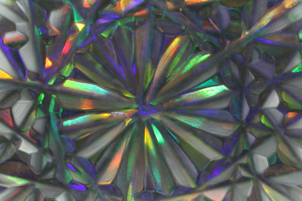 istock Star rainbow background. Blurred abstract creative background. Dark, purple and gray star background. Lens flare. Colorful bokeh light. Illuminated burst. Lights of the night city. Star background 1059292426