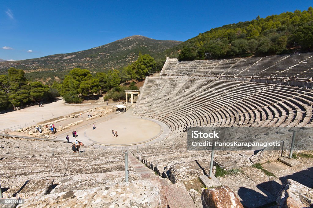 Top view of ancient amphitheater of Epidaurus of Greece Ancient amphitheater of Epidaurus at Peloponnese, Greece Amphitheater Stock Photo