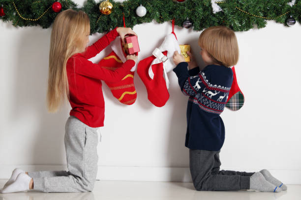 istock Children opens Christmas stocking 1059299602
