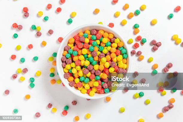 Bowl Of Colorful Cereal Balls On White Background Stock Photo - Download Image Now - Breakfast Cereal, Cereal Plant, Multi Colored