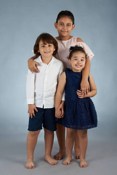 istock Portrait of hispanic kids 1059308828
