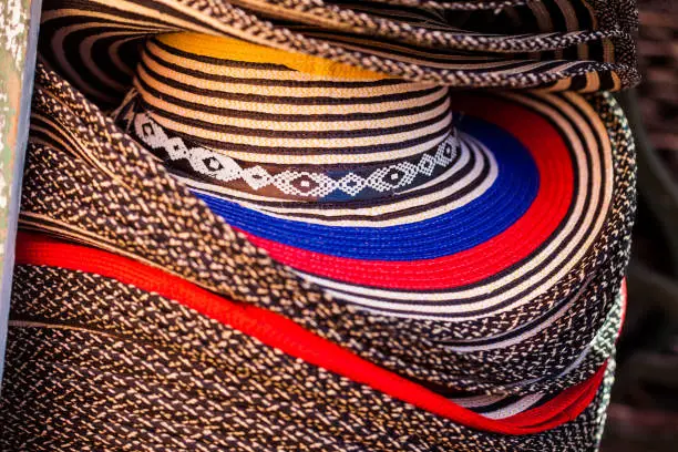 CARTAGENA DE INDIAS, COLOMBIA - AUGUST, 2018: Street sell of traditional hats from Colombia: "Sombrero vueltiao"