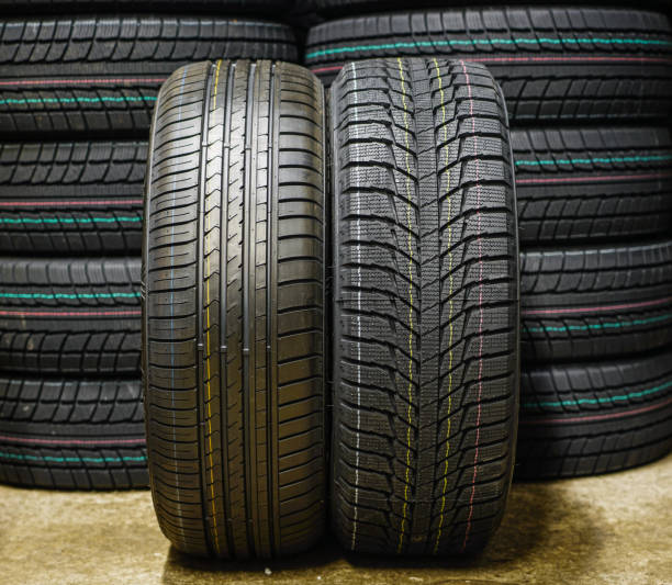 istock beside new winter tire without studs and summer tire 1059312644