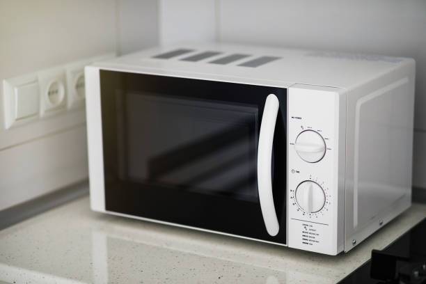 istock Modern kitchen interior with electric and microwave oven. 1059319530