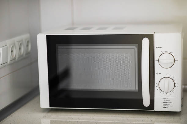 istock Modern kitchen interior with electric and microwave oven. 1059319550