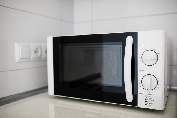 istock Modern kitchen interior with electric and microwave oven. 1059319554