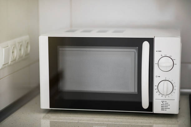 istock Modern kitchen interior with electric and microwave oven. 1059319558