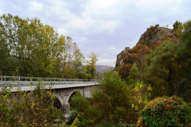 istock bridge over the river in autumn 1059320948