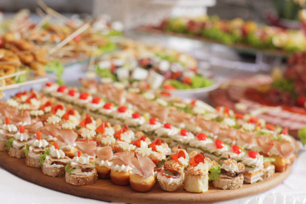 istock Assorted canape with cheese, meat, rolls, bakery and vegetables. selective focus 1059323208