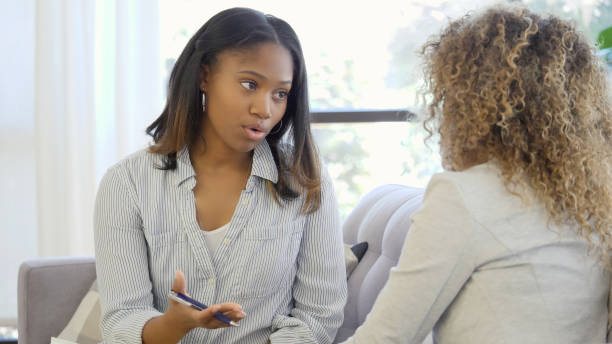istock Young counselor advises female patient 1059325852