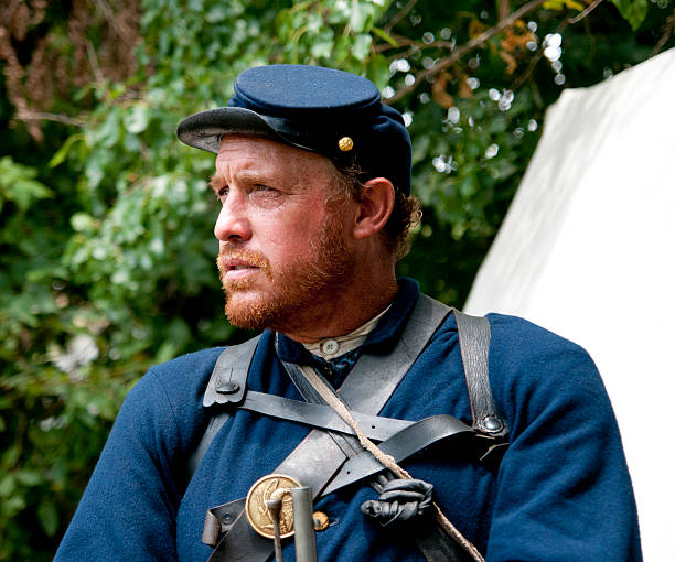 Guarding Camp Union soldier guarding the camp. reenactment stock pictures, royalty-free photos & images