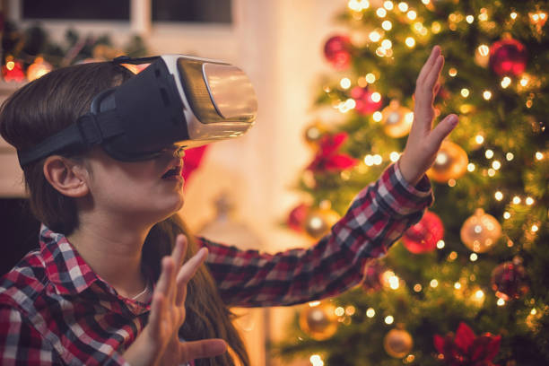 istock Teenage Girl Using Virtual Reality Simulator on Christmas 1059331952