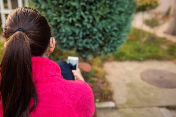 istock Girl with hearing aid 1059337414