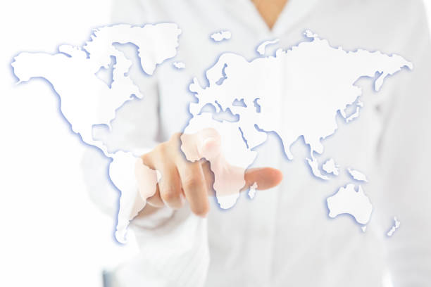 istock Business woman finger touching world map on a touch screen. 1059340104