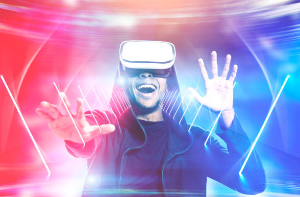istock Happy man in vr glasses, glowing wormhole 1059344398
