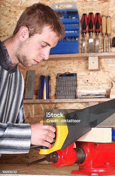 Young Male Sawing Stock Photo - Download Image Now - Activity, Adult, Art And Craft