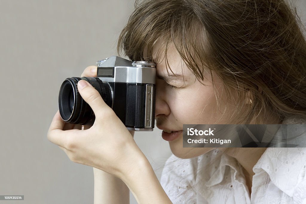 Ragazza con macchina fotografica - Foto stock royalty-free di Abbigliamento casual