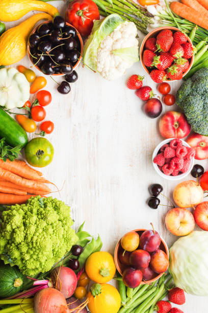 istock Summer fruits vegetables on table 1059357486