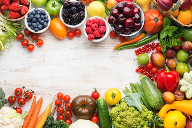 istock Summer fruits vegetables on table 1059357518