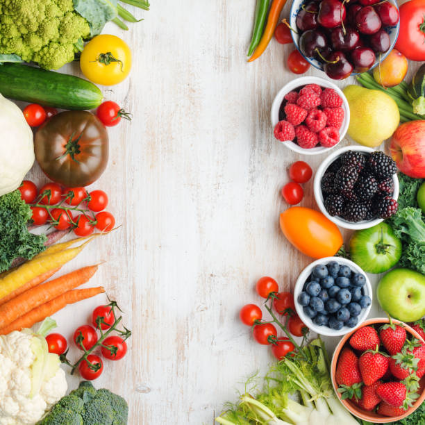 istock Summer fruits vegetables on table 1059357520