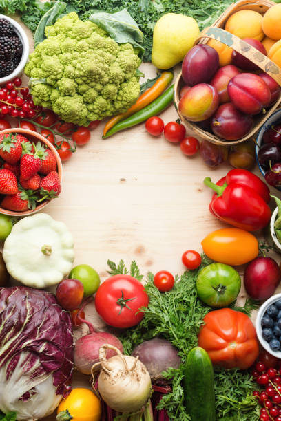 istock Summer fruits vegetables on table 1059357542