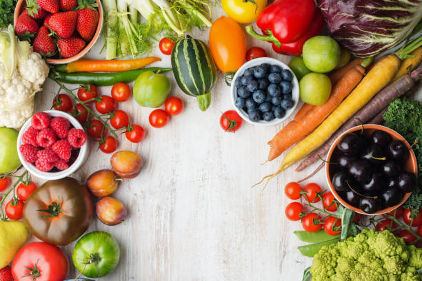 istock Summer fruits vegetables on table 1059357556