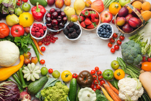 istock Summer fruits vegetables on table 1059357560
