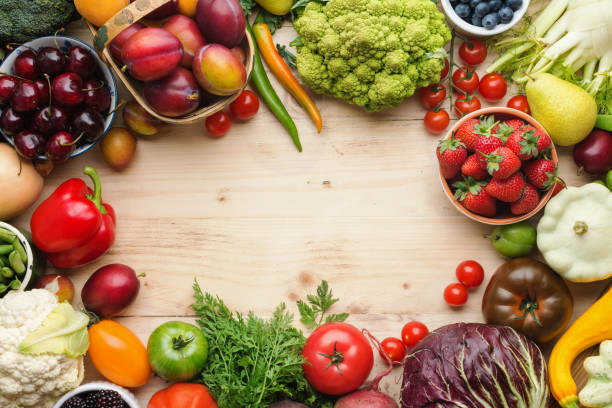 istock Summer fruits vegetables on table 1059357562