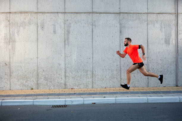 istock Man running on the street. 1059358172