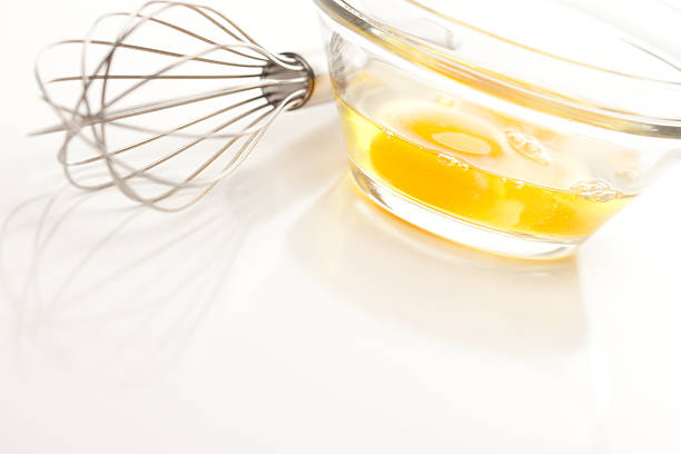 istock Hand Mixer with Eggs in Glass Bowl 105936091