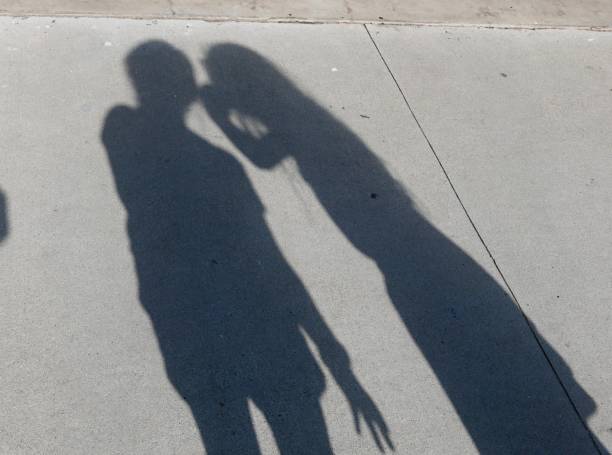 istock Expressive Shadows of girl on wall 1059365774