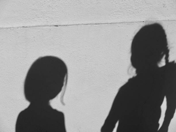 istock Expressive Shadows of girl on wall 1059365810