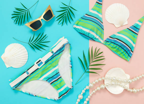 istock Tropical summer flat lay on turquoise and pink background 1059367042