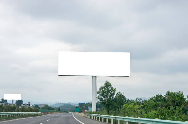 istock Blank billboard on blue sky background for new advertisement 1059367664