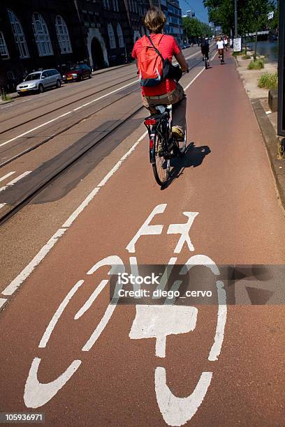Biking In The City Stock Photo - Download Image Now - Amsterdam, Bicycle, Adult