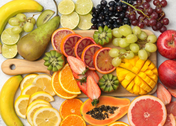 istock Rainbow fruits and berries 1059376102