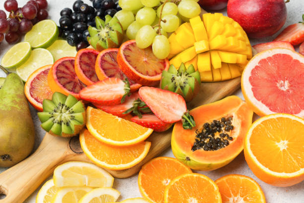 istock Rainbow fruits and berries 1059376104